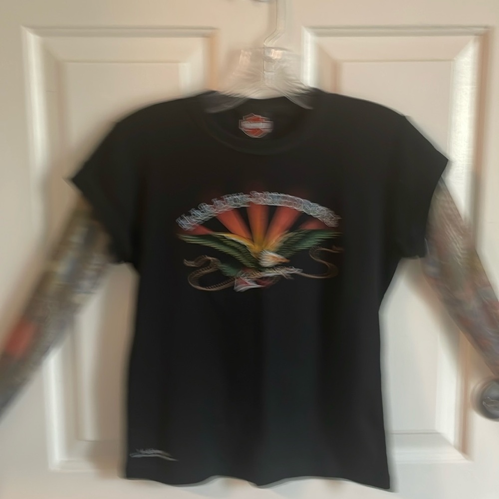 Harley tee with faux tattoo sleeves.
